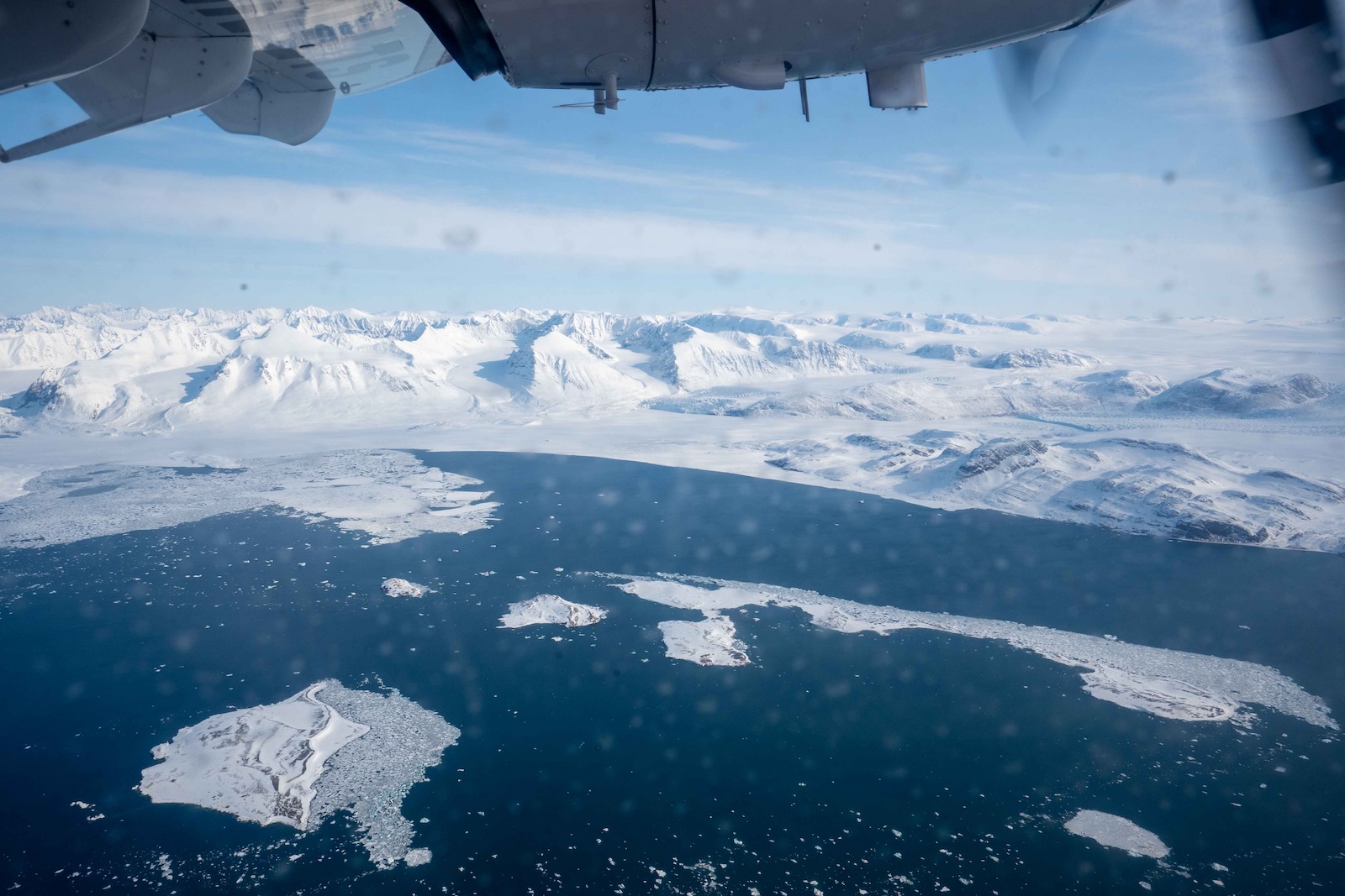 an aerial view of melting ice