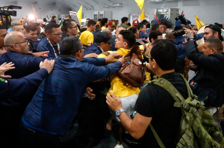 Climate protesters storm un talks in brazil as frustration mounts over bureaucratic gridlock